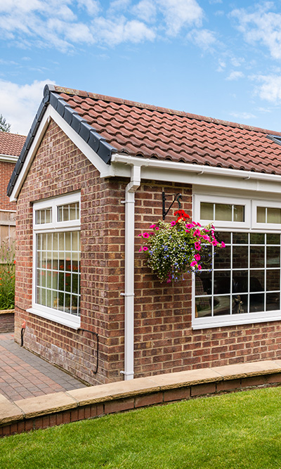 modern brick house with flower basket two stories beautiful garden